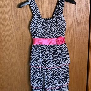 Emily West Zebra-print dress with ruffles and pink sash